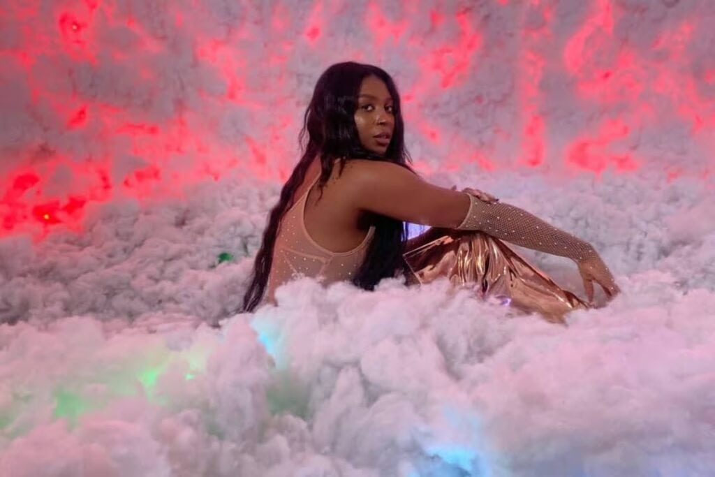 woman sat in LED cloud room